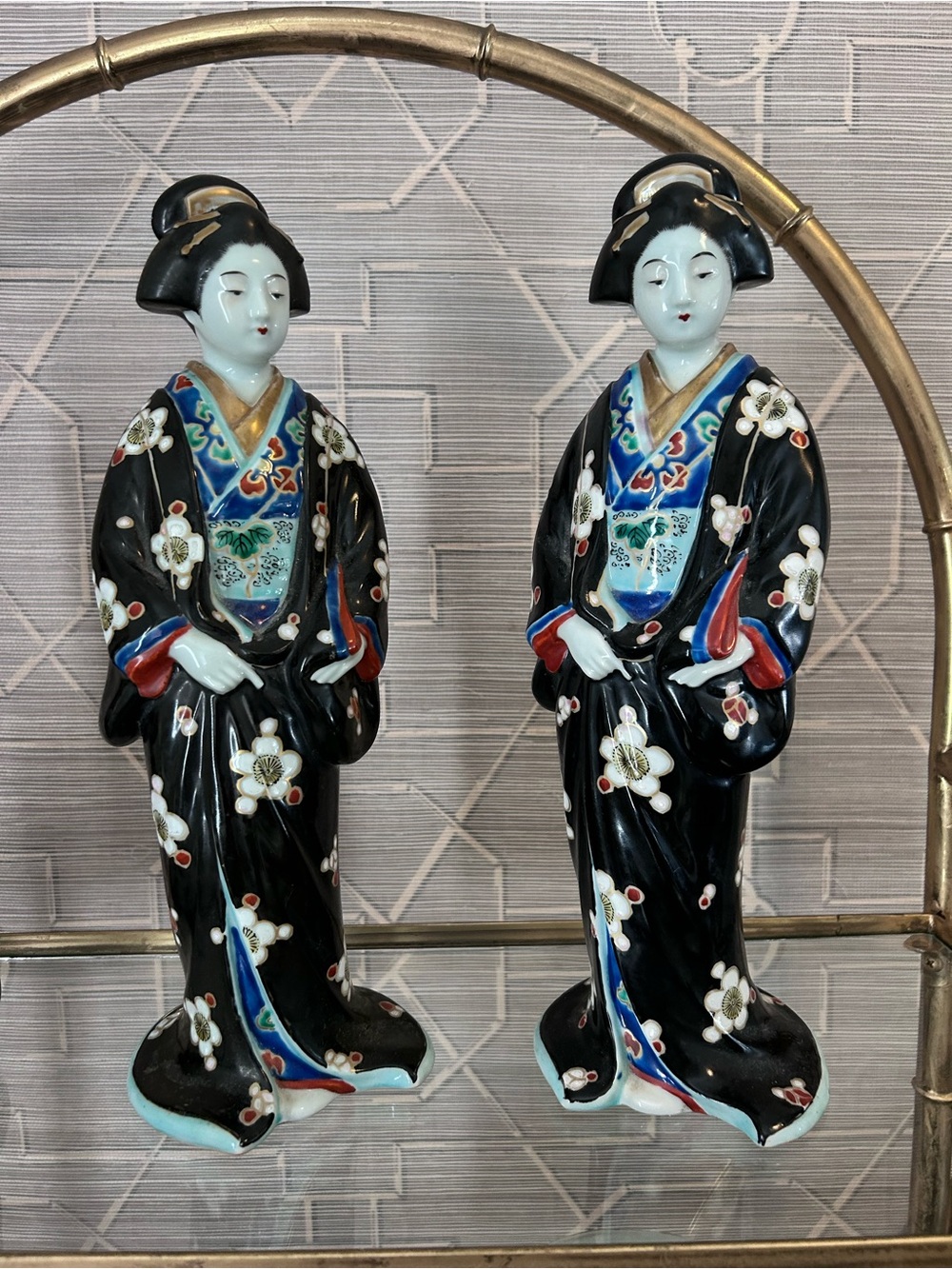 Pair of Black Porcelain Geisha Figurines with Multicolor Accents